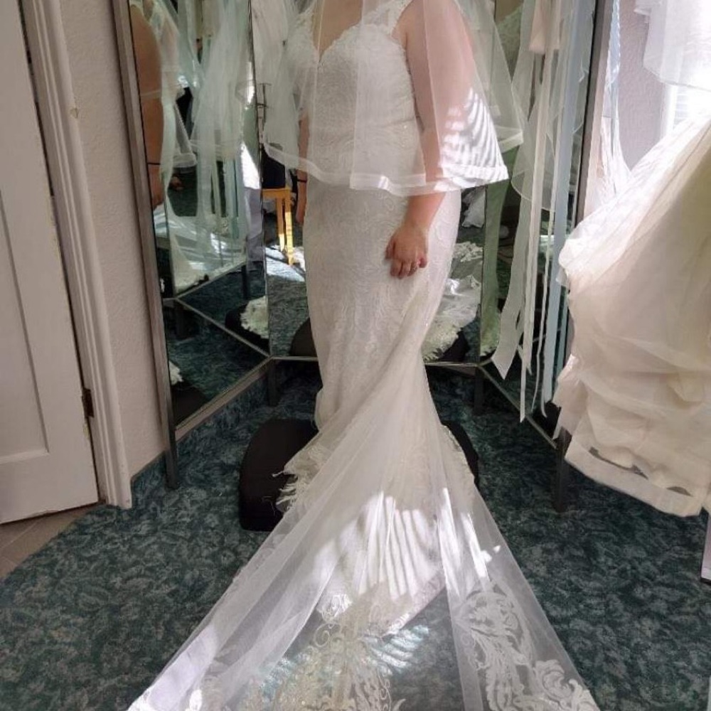 Dress came from England, beautiful and comfortable.